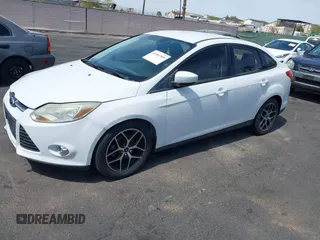 2012 Ford Focus SE with VIN 1FAHP3F24CL462319, listed as a IAAI auction lot 41981509 with 124,831 mi miles. Bid and sale history available at carsss.com. Image 6.