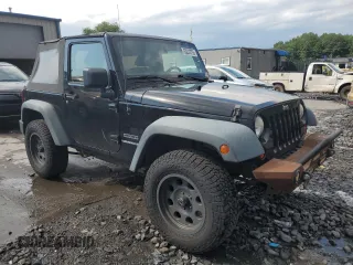 2011 Jeep Wrangler Sport z VIN 1J4GA2D16BL511735, wystawiony jako Copart lot #63292705 z przebiegiem 136 609 mil mil oraz Szkoda całkowita • Salvage title. Historia ofert i sprzedaży dostępna na DreamBid. Obrazek 4.