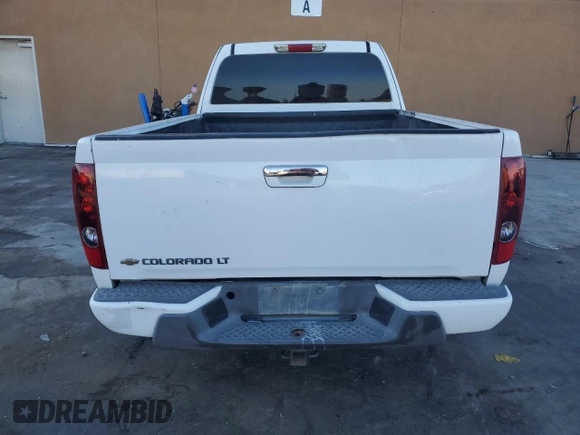 2009 Chevrolet Colorado Work Truck z VIN 1GCCS19E498149120, wystawiony jako Copart lot #72383104 z przebiegiem 296 546 mil mil oraz Szkoda całkowita • Salvage title. Historia ofert i sprzedaży dostępna na DreamBid. Obrazek 6.