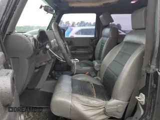 2009 Jeep Wrangler X with VIN 1J4FA241X9L735743, listed as a Copart auction lot 48109455 with 232,110 mi miles and Salvage Title. Bid and sale history available at DreamBid. Image 7.