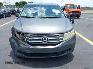 2012 Honda Odyssey EX-L с VIN 5FNRL5H69CB060174, выставлен на аукционе IAAI как лот 42335345 с пробегом 150 457 миль миль и . История ставок и продаж доступна на DreamBid. Изображение 12.