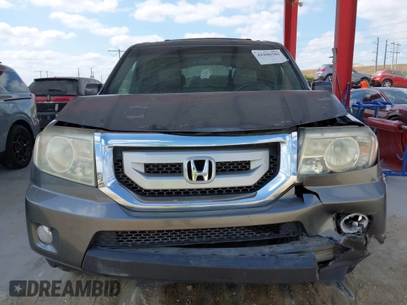 2011 Honda Pilot EX-L z VIN 5FNYF4H61BB040660, wystawiony jako IAAI lot #42106783 z przebiegiem 247 869 mil mil oraz . Historia ofert i sprzedaży dostępna na DreamBid. Obrazek 12.