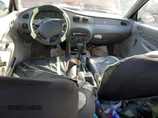 1999 Ford Escort SE with VIN 1FAFP13P2XW277282, listed as a Copart auction lot 88804865 with 164,056 mi miles and Salvage Title. Bid and sale history available at carsss.com. Image 8.