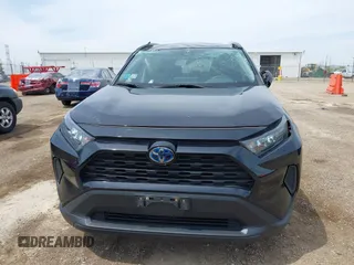 2021 Toyota RAV4 Hybrid LE with VIN 2T3L6RFV7MW011159, listed as a IAAI auction lot 42212998 with 104,626 mi miles and . Bid and sale history available at DreamBid. Image 12.