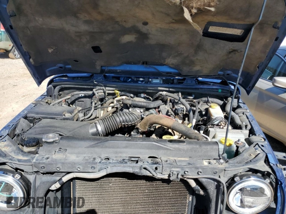 2010 Jeep Wrangler Unlimited Sahara with VIN 1J4BA5H19AL171369, listed as a Copart auction lot 50412855 with 152,742 mi miles and Salvage Title. Bid and sale history available at carsss.com. Image 12.