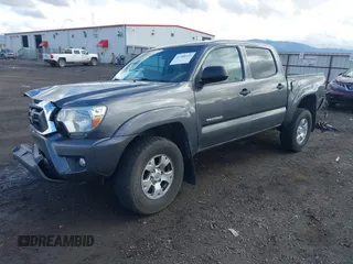 2014 Toyota Tacoma with VIN 3TMLU4EN1EM158171, listed as a IAAI auction lot 41980335 with 193,444 mi miles. Bid and sale history available at carsss.com. Image 18.
