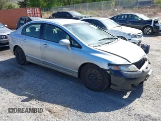 2009 Honda Civic LX z VIN 2HGFA165X9H361956, wystawiony jako IAAI lot #42032333 z przebiegiem 461 180 mil mil oraz . Historia ofert i sprzedaży dostępna na DreamBid. Obrazek 1.