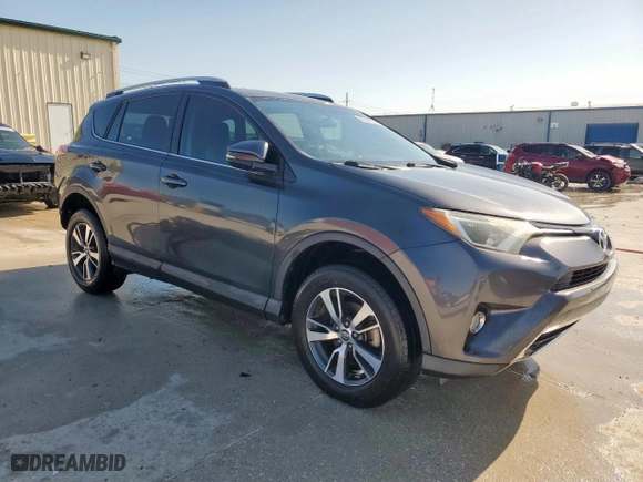 2016 Toyota RAV4 XLE with VIN 2T3WFREV2GW292774, listed as a Copart auction lot 52349865 with 96,896 mi miles and Salvage Title. Bid and sale history available at carsss.com. Image 4.