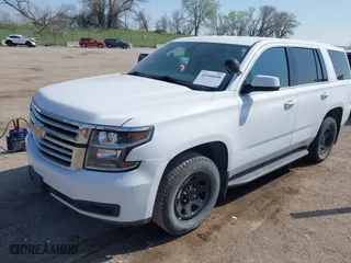 2020 Chevrolet Tahoe Commercial with VIN 1GNSKDEC8LR258254, listed as a IAAI auction lot 42104608 with 105,895 mi miles. Bid and sale history available at carsss.com. Image 18.