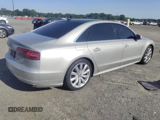 2017 Audi A8 with VIN WAU44AFD3HN014802, listed as a IAAI auction lot 42573537 with 121,096 mi miles and . Bid and sale history available at DreamBid. Image 4.