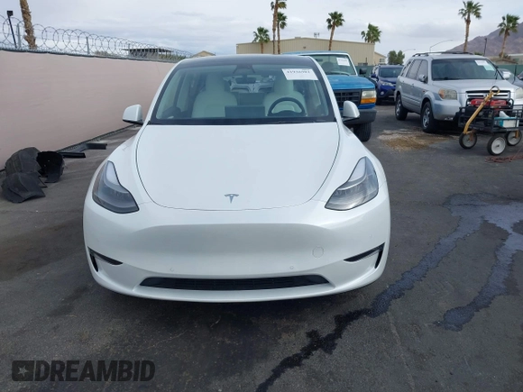 2023 Tesla Model Y Performance with VIN 7SAYGDEFXPF589477, listed as a IAAI auction lot 41936981 with 28,993 mi miles and . Bid and sale history available at DreamBid. Image 13.