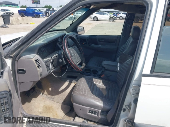 1994 Jeep Grand Cherokee Laredo with VIN 1J4FX58SXRC120936, listed as a IAAI auction lot 42530212 with 126,367 mi miles and . Bid and sale history available at DreamBid. Image 5.