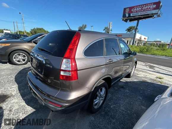 2011 Honda CR-V EX-L z VIN 5J6RE4H74BL060649, wystawiony jako Copart lot #61692905 z przebiegiem 183 943 mil mil oraz Czysty tytuł • Clean title. Historia ofert i sprzedaży dostępna na DreamBid. Obrazek 4.