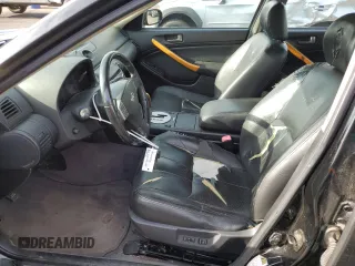 2004 Infiniti G35 w/Leather z VIN JNKCV51F34M708688, wystawiony jako Copart lot #59127945 z przebiegiem 199 727 mil mil oraz Szkoda całkowita • Salvage title. Historia ofert i sprzedaży dostępna na DreamBid. Obrazek 7.