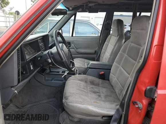 1996 Jeep Cherokee Sport with VIN 1J4FT68S8TL232241, listed as a Copart auction lot 82170904 with 287,125 mi miles and Salvage Title. Bid and sale history available at carsss.com. Image 7.