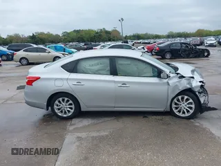 2019 Nissan Sentra S z VIN 3N1AB7AP7KY425276, wystawiony jako IAAI lot #41745256 z przebiegiem 72 306 mil mil oraz . Historia ofert i sprzedaży dostępna na DreamBid. Obrazek 14.