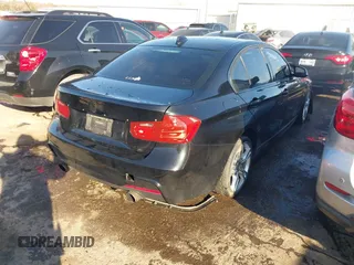 2014 BMW 3 Series 335i with VIN WBA3A9G55ENS64791, listed as a IAAI auction lot 40997669 with 65,335 mi miles. Bid and sale history available at carsss.com. Image 4.