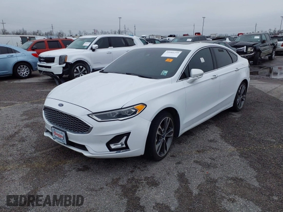 2019 Ford Fusion Titanium with VIN 3FA6P0D9XKR186685, listed as a IAAI auction lot 39181239 with Not provided miles and . Bid and sale history available at DreamBid. Image 2.