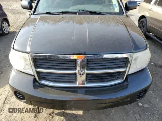 2008 Dodge Durango z VIN 1D8HB38N58F148394, wystawiony jako Copart lot #77639694 z przebiegiem 163 971 mil mil oraz Szkoda całkowita • Salvage title. Historia ofert i sprzedaży dostępna na DreamBid. Obrazek 12.