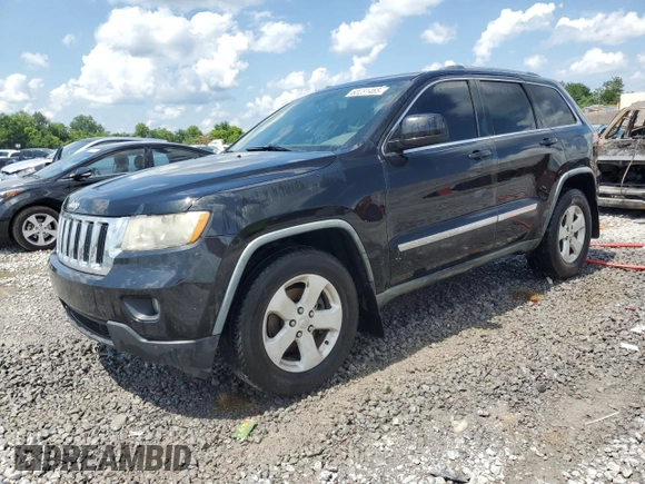 2011 Jeep Grand Cherokee Laredo with VIN 1J4RR4GG6BC538074, listed as a Copart auction lot 60231465 with 203,942 mi miles and Salvage title. Bid and sale history available at DreamBid. Image 1.