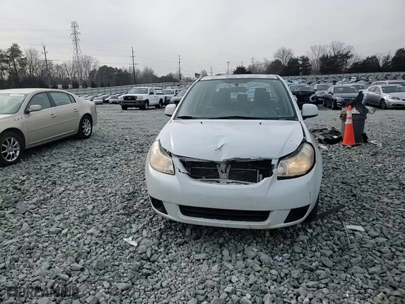 2013 Suzuki SX4 LE with VIN JS2YC5A37D6101979, listed as a Copart auction lot 42185855 with 118,855 mi miles and Salvage Title. Bid and sale history available at carsss.com. Image 10.