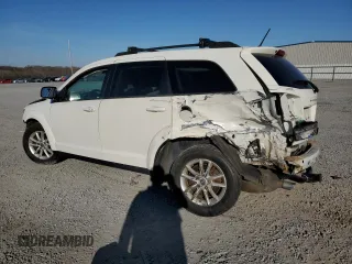 2013 Dodge Journey SXT with VIN 3C4PDCBG7DT689297, listed as a Copart auction lot 47303385 with 129,120 mi miles and Salvage Title. Bid and sale history available at carsss.com. Image 2.