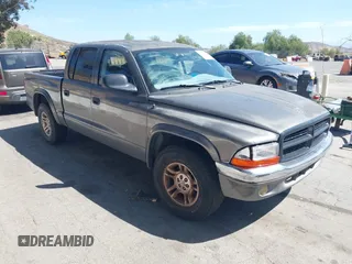 2002 Dodge Dakota SLT z VIN 1B7HL48N32S587531, wystawiony jako IAAI lot #42266638 z przebiegiem 151 397 mil mil oraz . Historia ofert i sprzedaży dostępna na DreamBid. Obrazek 1.