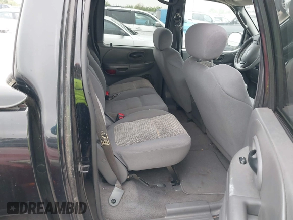 2003 Ford F-150 XLT with VIN 1FTRW07613KD14135, listed as a IAAI auction lot 41879756 with 197,515 mi miles. Bid and sale history available at carsss.com. Image 8.