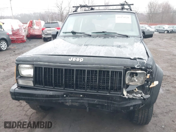1995 Jeep Cherokee Sport with VIN 1J4FJ68S7SL572730, listed as a IAAI auction lot 41474520 with 189,907 mi miles. Bid and sale history available at carsss.com. Image 6.
