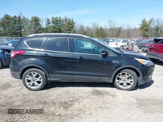 2014 Ford Escape Titanium with VIN 1FMCU9JX2EUA96338, listed as a IAAI auction lot 41806850 with 127,745 mi miles. Bid and sale history available at carsss.com. Image 13.