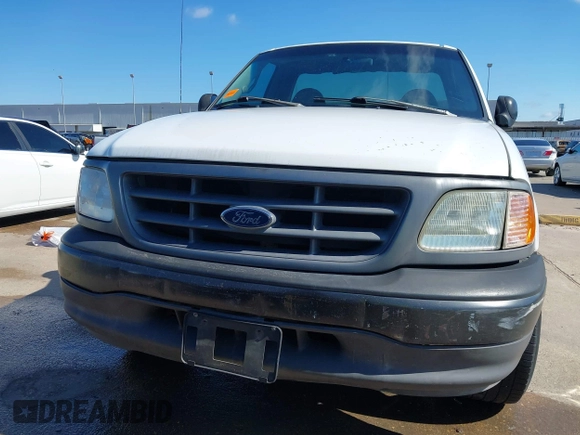 2000 Ford F-150 with VIN 1FTZF1728YKA54035, listed as a IAAI auction lot 42236191 with Not provided miles and . Bid and sale history available at DreamBid. Image 12.