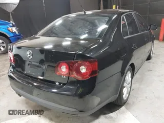 2010 Volkswagen Jetta SE z VIN 3VWRZ7AJ3AM157188, wystawiony jako IAAI lot #41816829 z przebiegiem 188 180 mil mil oraz . Historia ofert i sprzedaży dostępna na DreamBid. Obrazek 4.