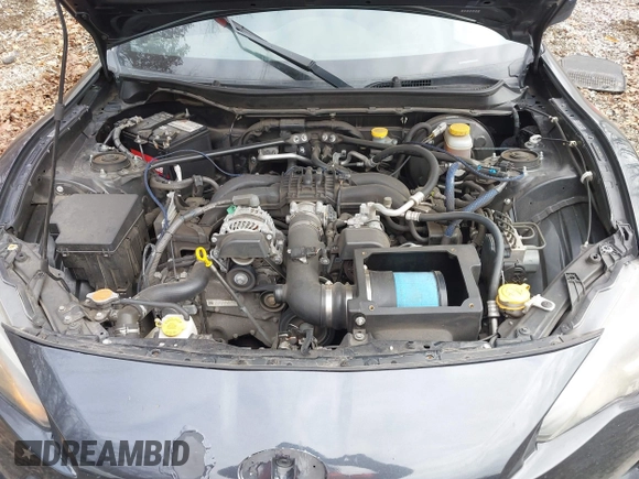 2015 Scion FR-S with VIN JF1ZNAA12F9713465, listed as a IAAI auction lot 41199978 with 96,993 mi miles. Bid and sale history available at carsss.com. Image 10.