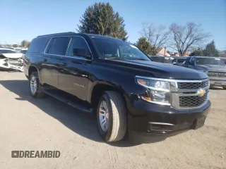 2015 Chevrolet Suburban LT with VIN 1GNSKJKC0FR201554, listed as a Copart auction lot 45614633 with 81,400 mi miles and . Bid and sale history available at DreamBid. Image 4.