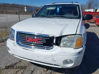 2007 GMC Envoy SLE with VIN 1GKDS13S772142847, listed as a IAAI auction lot 41605904 with 131,564 mi miles. Bid and sale history available at carsss.com. Image 6.