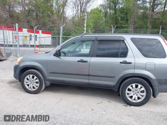 2006 Honda CR-V EX with VIN SHSRD78816U427608, listed as a IAAI auction lot 42094222 with 301,345 mi miles and . Bid and sale history available at carsss.com. Image 14.