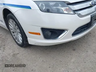 2011 Ford Fusion Hybrid z VIN 3FADP0L34BR202769, wystawiony jako IAAI lot #42504494 z przebiegiem 33 902 mil mil oraz . Historia ofert i sprzedaży dostępna na DreamBid. Obrazek 6.