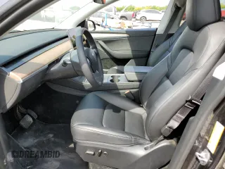 2024 Tesla Model Y Long Range z VIN 7SAYGDEE3RA234223, wystawiony jako Copart lot #51784185 z przebiegiem 24 257 mil mil oraz Szkoda całkowita • Salvage title. Historia ofert i sprzedaży dostępna na DreamBid. Obrazek 7.