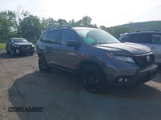 2019 Honda Passport Elite with VIN 5FNYF8H0XKB030776, listed as a IAAI auction lot 42329612 with 28,017 mi miles and . Bid and sale history available at DreamBid. Image 1.