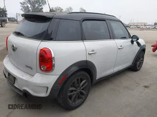 2011 MINI Countryman S with VIN WMWZC3C52BWL78647, listed as a IAAI auction lot 42459886 with 142,407 mi miles and . Bid and sale history available at DreamBid. Image 4.