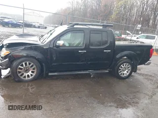 2011 Nissan Frontier Pro-4X with VIN 1N6AD0EV5BC440663, listed as a IAAI auction lot 41923918 with 168,331 mi miles and . Bid and sale history available at DreamBid. Image 14.