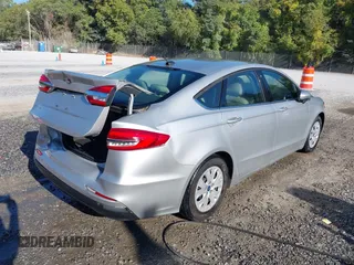 2019 Ford Fusion S with VIN 3FA6P0G70KR209661, listed as a IAAI auction lot 40319091 with 46,466 mi miles and . Bid and sale history available at DreamBid. Image 4.