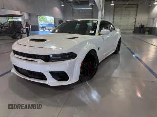 2021 Dodge Charger SRT Hellcat Widebody z VIN 2C3CDXL93MH662407, wystawiony jako Copart lot #58264615 z przebiegiem 56 012 mil mil oraz Czysty tytuł • Clean title. Historia ofert i sprzedaży dostępna na DreamBid. Obrazek 2.