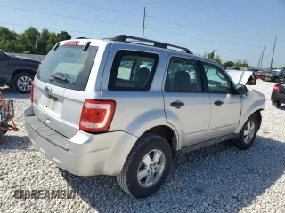 2011 Ford Escape XLS с VIN 1FMCU0C70BKB97667, выставлен на аукционе Copart как лот 52709365 с пробегом 140 582 миль миль и Списание • Salvage title. История ставок и продаж доступна на DreamBid. Изображение 3.