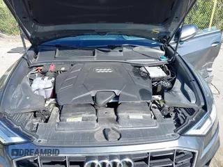 2021 Audi Q8 Premium Plus z VIN WA1EVAF15MD035056, wystawiony jako IAAI lot #41534412 z przebiegiem 65 579 mil mil oraz . Historia ofert i sprzedaży dostępna na DreamBid. Obrazek 10.