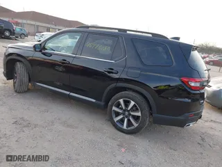 2024 Honda Pilot Touring with VIN 5FNYG1H72RB007519, listed as a IAAI auction lot 40973780 with 24,908 mi miles. Bid and sale history available at carsss.com. Image 3.