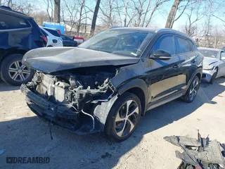2017 Hyundai Tucson Value with VIN KM8J33A24HU343231, listed as a IAAI auction lot 41395327 with 133,017 mi miles. Bid and sale history available at carsss.com. Image 18.