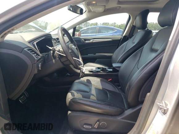 2014 Ford Fusion Titanium с VIN 3FA6P0K90ER363283, выставлен на аукционе Copart как лот 55156795 с пробегом 54 099 миль миль и Списание • Salvage title. История ставок и продаж доступна на DreamBid. Изображение 7.