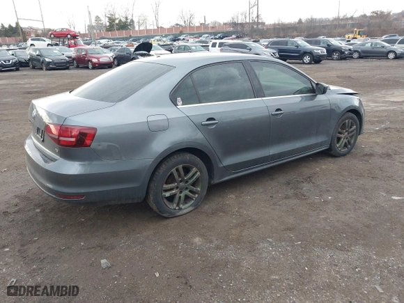 2017 Volkswagen Jetta 1.4T S with VIN 3VW167AJ3HM348674, listed as a IAAI auction lot 41479942 with 145,698 mi miles. Bid and sale history available at carsss.com. Image 4.