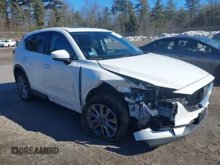 2019 Mazda CX-5 Grand Touring with VIN JM3KFBDM2K0672720, listed as a IAAI auction lot 41751196 with 51,632 mi miles and . Bid and sale history available at carsss.com. Image 6.